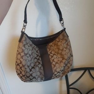 Brown and tan coach purse